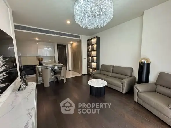 Luxurious modern living room with elegant chandelier and stylish furniture