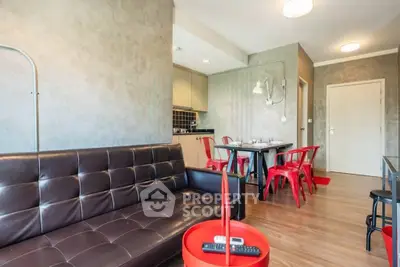 Modern living room with stylish decor and open kitchen layout