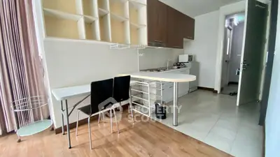 Modern kitchen with open layout and dining area in stylish apartment