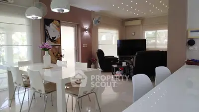 Spacious modern living room with dining area and stylish decor