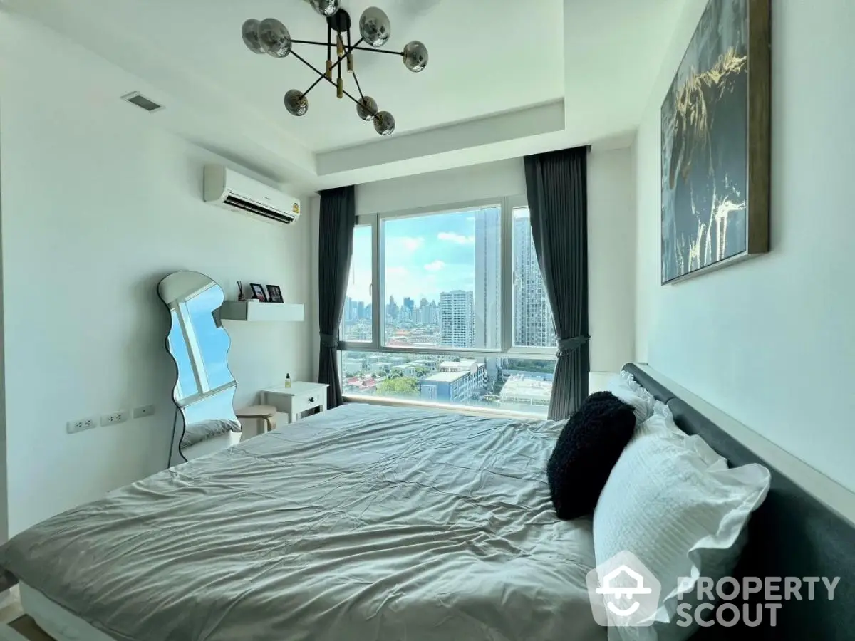 Modern bedroom with city view and stylish decor