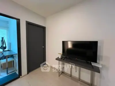Modern living room with sleek TV setup and minimalist decor