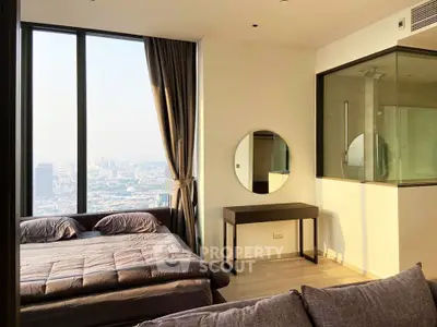 Luxurious bedroom with panoramic city view and modern decor