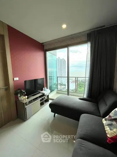 Modern living room with city view and stylish furniture in high-rise apartment