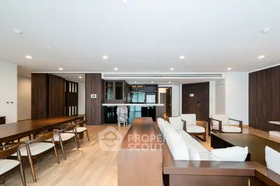 Spacious modern living room with elegant wooden furniture and open layout
