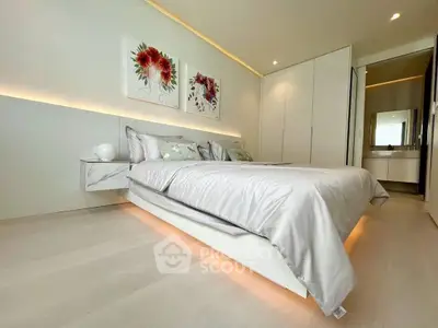 Luxurious modern bedroom with elegant decor and ambient lighting, featuring a stylish bed and built-in wardrobe.