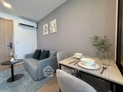 Modern living room with cozy sofa and dining area in stylish apartment