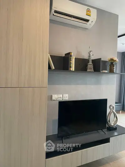 Modern living room with sleek TV unit and stylish decor