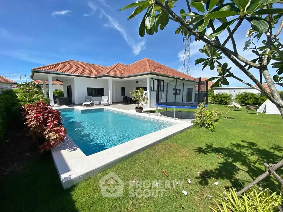 Luxurious villa with private pool and lush garden, perfect for serene living and entertaining.