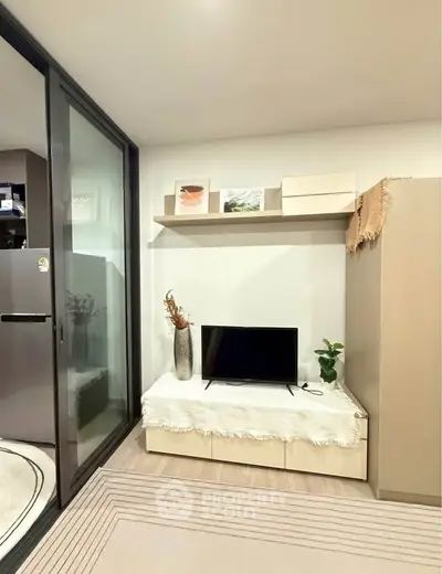 Modern living room with sleek TV setup and stylish decor