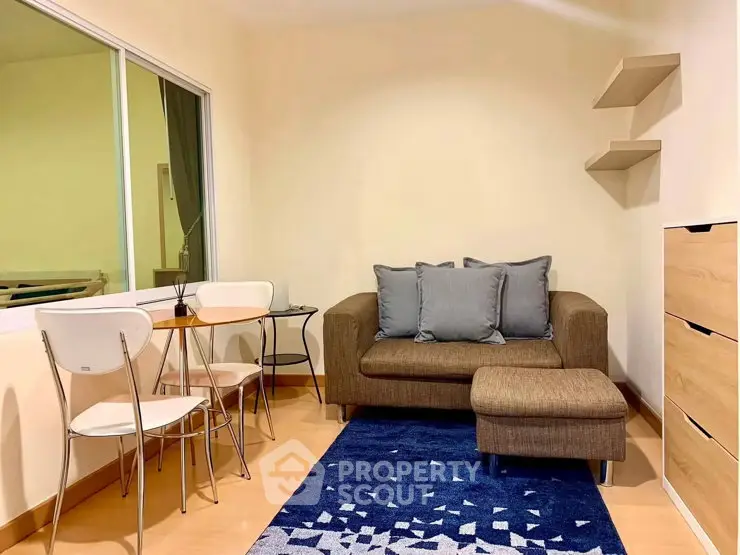 Cozy living room with modern furniture and stylish decor in a bright apartment.