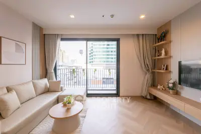 Modern living room with elegant decor and balcony view in urban apartment