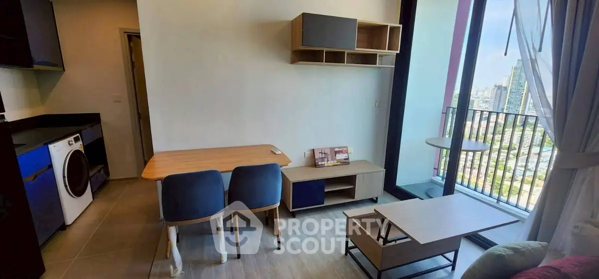 Modern apartment living room with balcony and city view