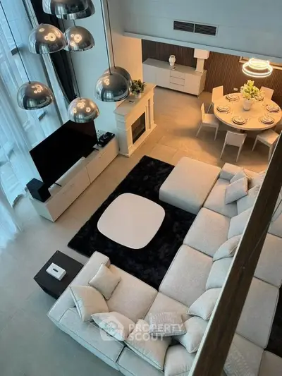Luxurious modern living room with elegant decor and spacious seating area