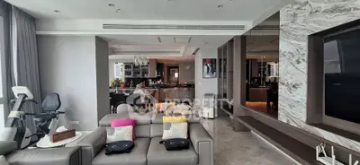 Luxurious open-plan living room with modern kitchen and stylish decor