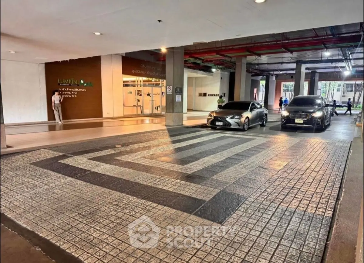 Modern parking area with luxury cars in a stylish residential building