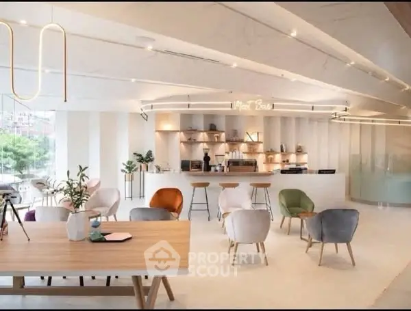 Modern open-plan living space with stylish furniture and contemporary design.