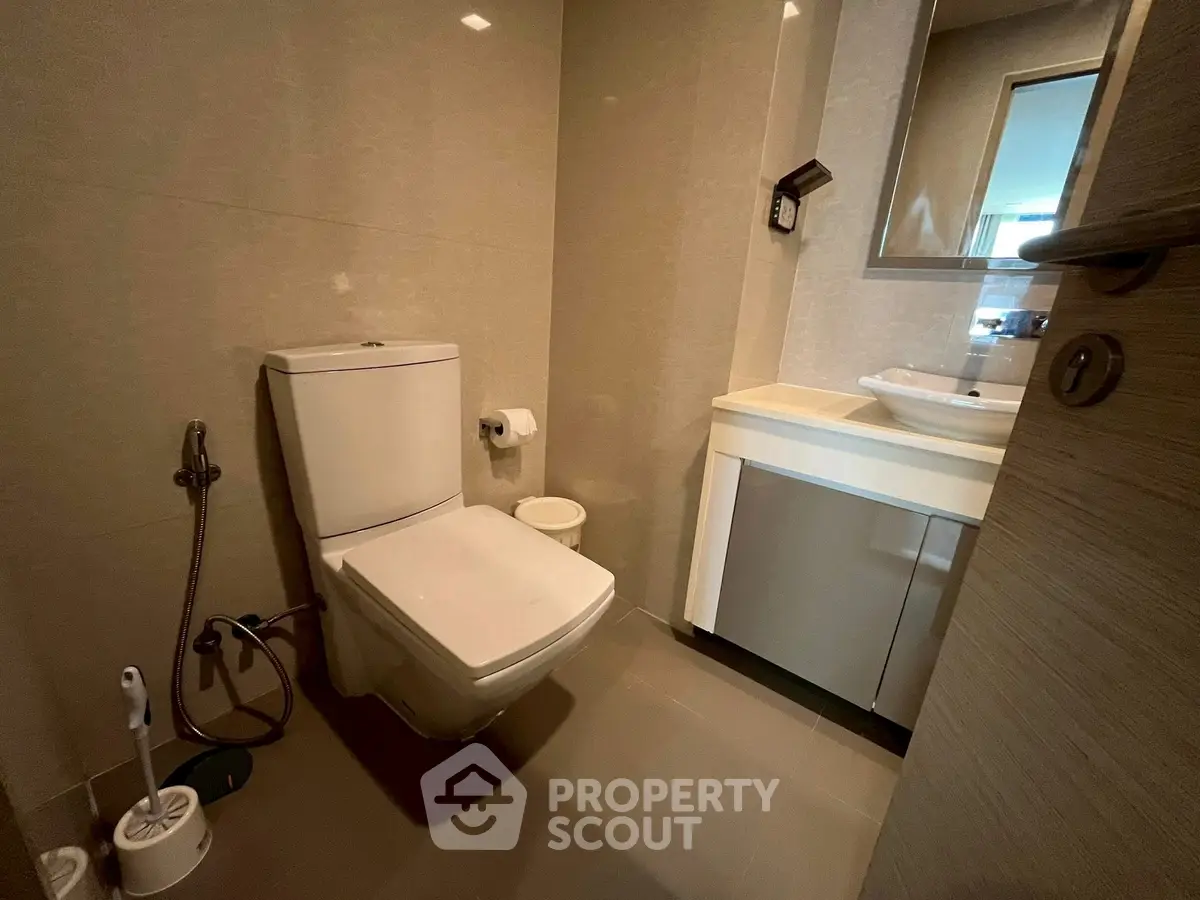 Modern bathroom with sleek fixtures and elegant design in a contemporary home.