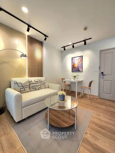 Modern living room with stylish decor and cozy seating area