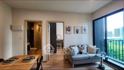 Modern living room with balcony view in stylish apartment