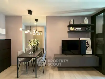 Modern living room with sleek furniture and stylish decor, perfect for contemporary living.