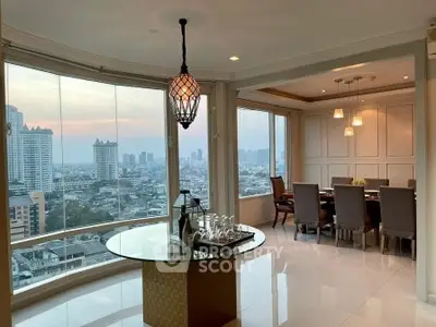 Luxurious dining area with panoramic city view and elegant lighting