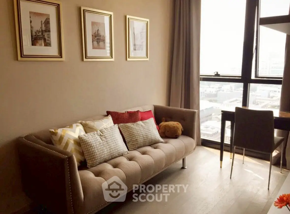 Chic living room with stylish sofa and city view, perfect for modern urban living.