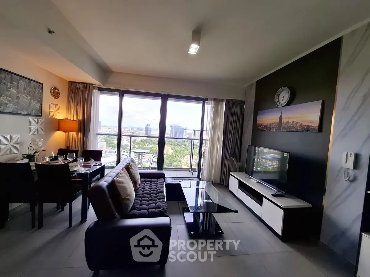 Modern living room with stunning city view and stylish decor