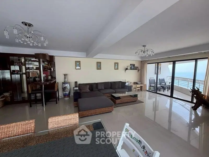 Spacious living room with ocean view and modern decor