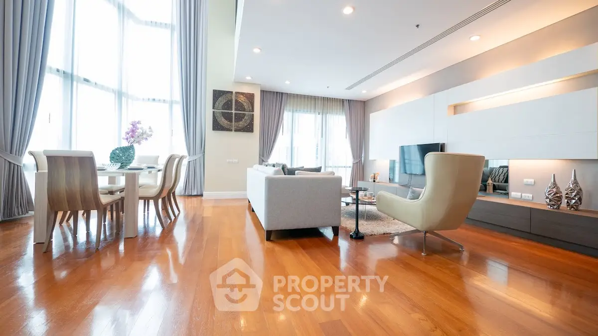 Spacious modern living room with elegant decor and natural light