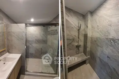 Modern bathroom with sleek design and glass shower enclosure