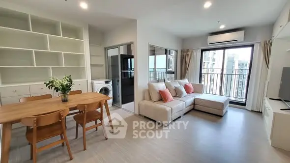 Modern living room with open layout and balcony view