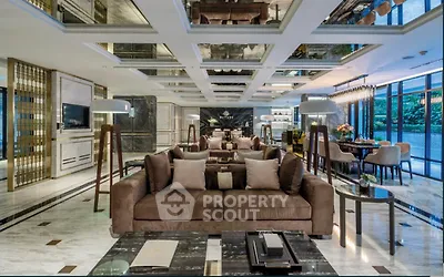 Luxurious modern living room with elegant decor and spacious seating area.