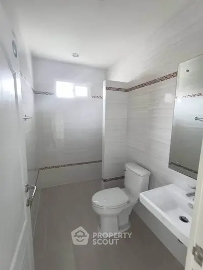 Modern bathroom with sleek fixtures and natural light
