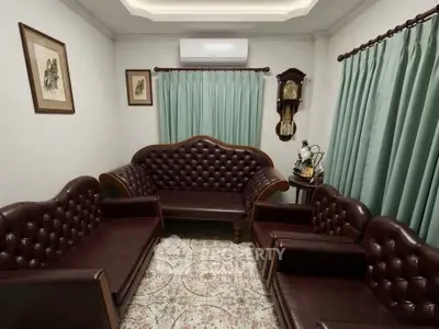Elegant living room with vintage leather sofas and classic decor
