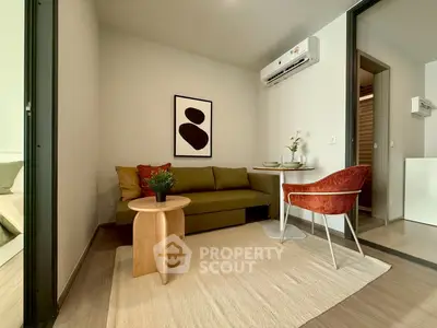 Modern living room with stylish decor and air conditioning