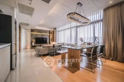 Luxurious modern living room with elegant dining area and large windows