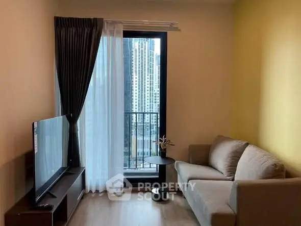 Modern living room with city view, cozy sofa, and large TV, perfect for urban living.