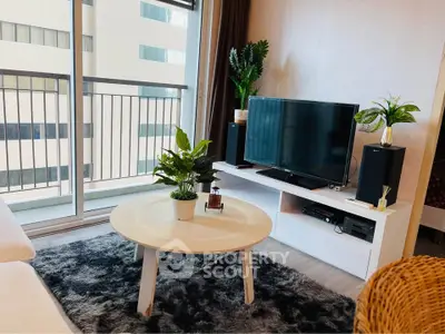 Modern living room with cozy decor and large window view