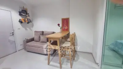 Cozy living room with modern sofa and stylish dining area