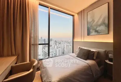 Luxurious bedroom with stunning city view and elegant decor