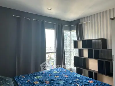 Modern bedroom with large windows and stylish shelving unit