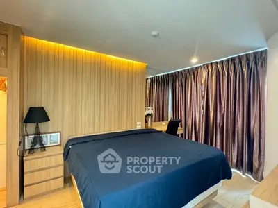 Luxurious bedroom with modern wooden paneling and elegant lighting