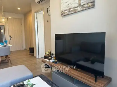 Modern living room with sleek TV setup and stylish decor