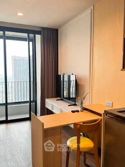 Modern living room with balcony view in high-rise apartment