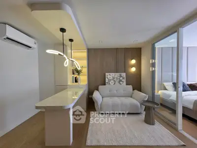 Modern living room with stylish lighting and cozy seating area