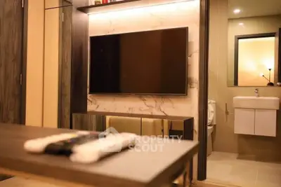 Modern living room with sleek TV setup and elegant decor