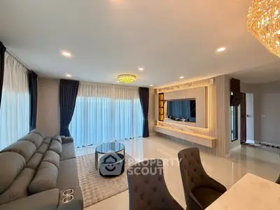 Luxurious modern living room with elegant decor and ample natural light