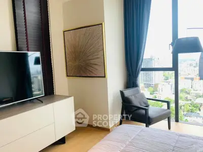 Modern bedroom with city view, stylish decor, and large window for natural light.