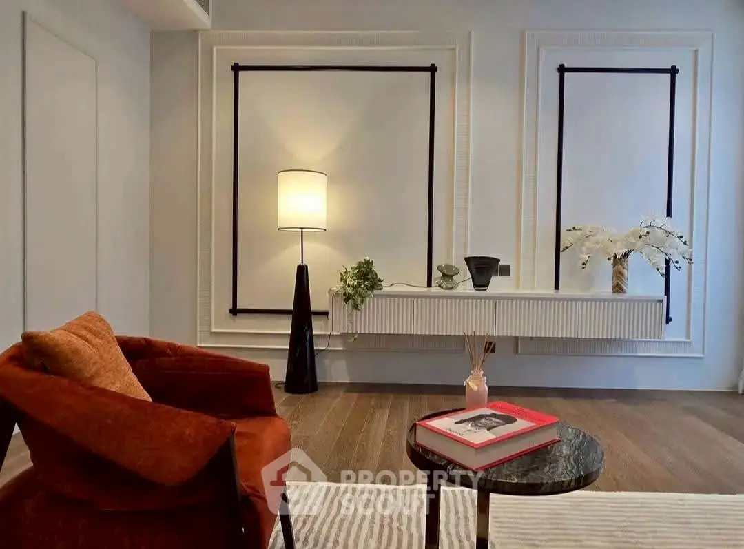 Stylish modern living room with elegant decor and cozy seating area.